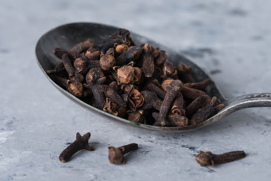 What are the benefits of using cloves in our daily lives?