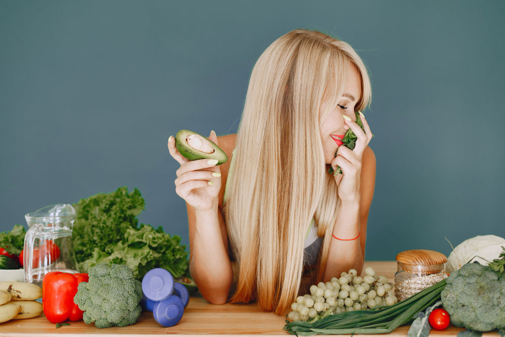What are some natural food sources rich in biotin and other vitamins and minerals that promote healthy hair?