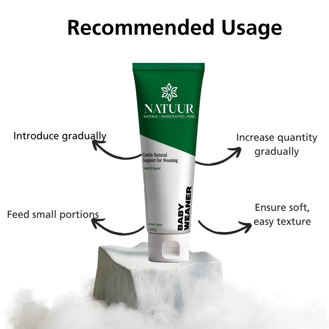 Natuur.in Baby Weaner tube on a stone base with usage instructions for natural thumb-sucking and weaning support.