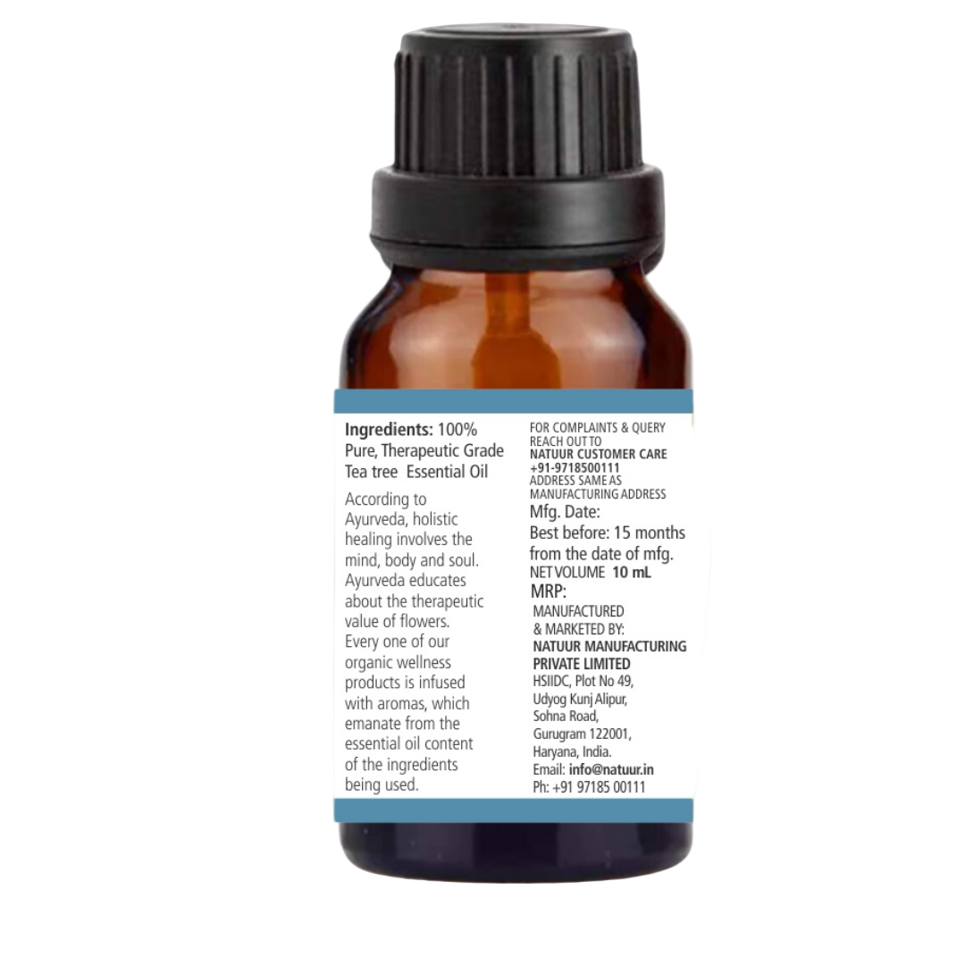 Natuur.in PURITY tea tree essential oil in a 10ml amber glass bottle with a detailed product label