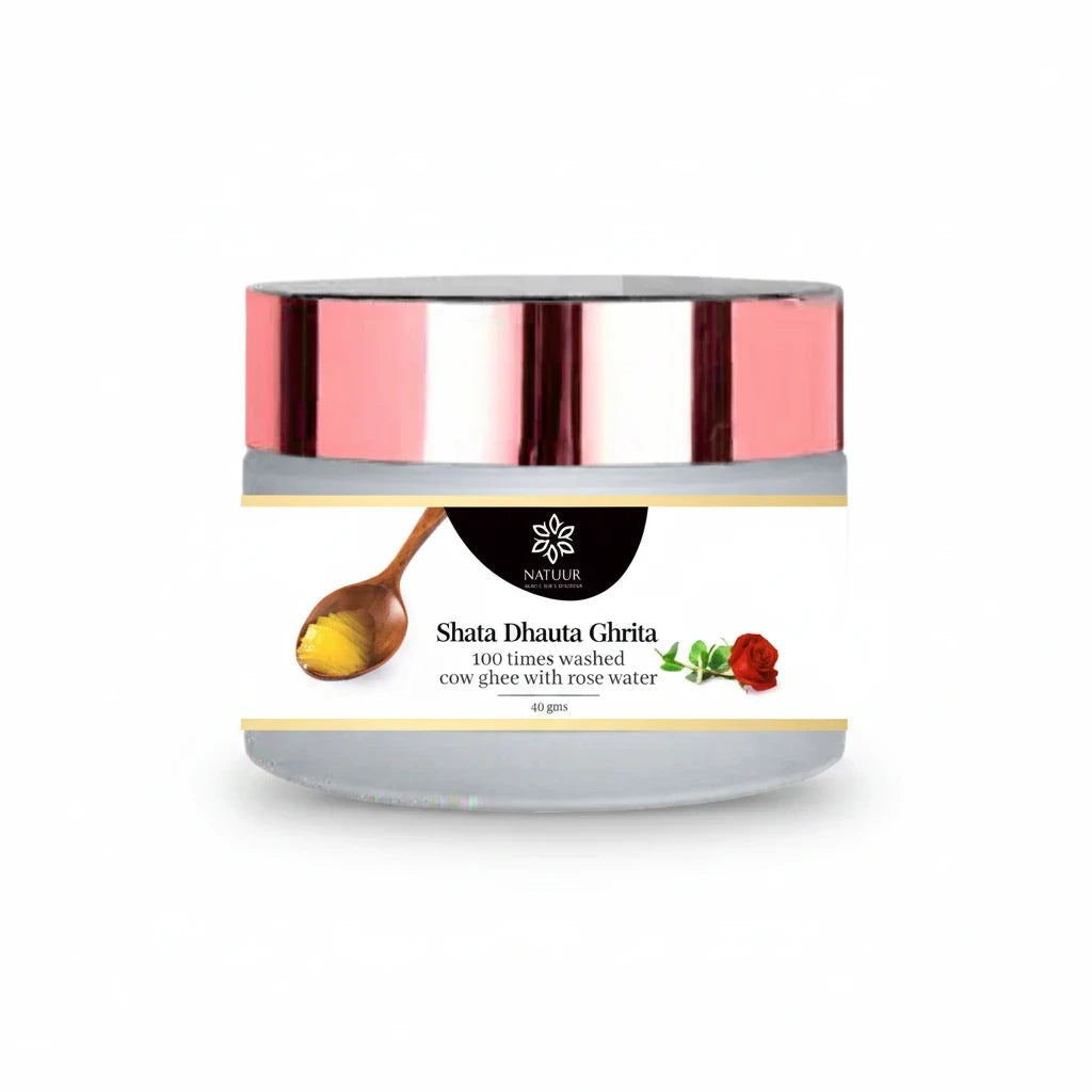 Natuur.in Shata Dhauta Ghrita rose night cream in a glass jar with a rose gold lid and label showing ghee and a rose.
